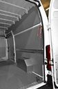 04_A marble-look plywood floor liner and painted metal wall lining panels in the Fiat Ducato